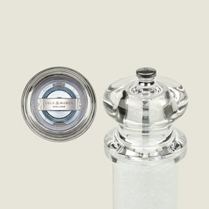 #salt&pepperset
A clear acrylic Cole & Mason 505 Salt & Pepper Mill, shown from top and side, reveals the grinding mechanism and salt crystals. The top view features the brand label, highlighting its adjustable settings and durable acrylic design.