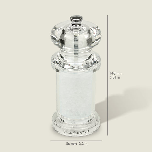 #salt&pepperset
The Cole & Mason 505 Salt Grinder has adjustable settings, comes pre-filled with coarse salt, and stands 140 mm tall. Made from clear acrylic, it features the Cole & Mason logo at the base against a pale off-white background.