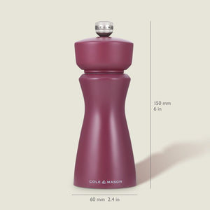 A red Kenton Sichuan Pepper Salt & Pepper Mill by Cole & Mason with a ceramic mechanism stands upright on a light background. Dimensions: 150 mm (6 in) height, 60 mm (2.4 in) width. The Cole & Mason logo is near the base.