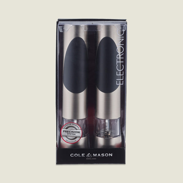 The Cole & Mason Richmond Electronic Salt & Pepper Mill Set includes two stainless steel mills with black accents, battery-powered grinding, the Precision System, and adjustable grind levels, shown against a plain background.